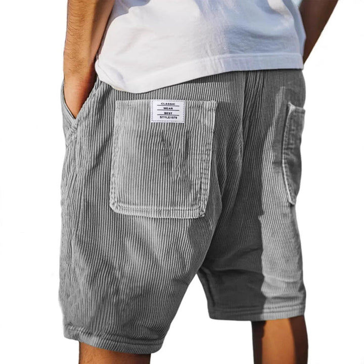 Mens refined tailored shorts front view in textured summer style fabric