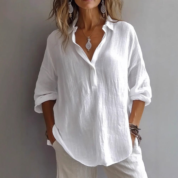 Close-up of the V-neck collar detail on a womens casual shirt