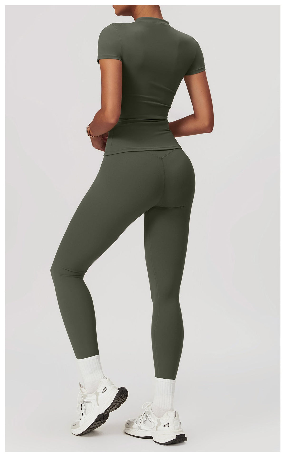 Womens workout clothes set showing contour shaping design lines
