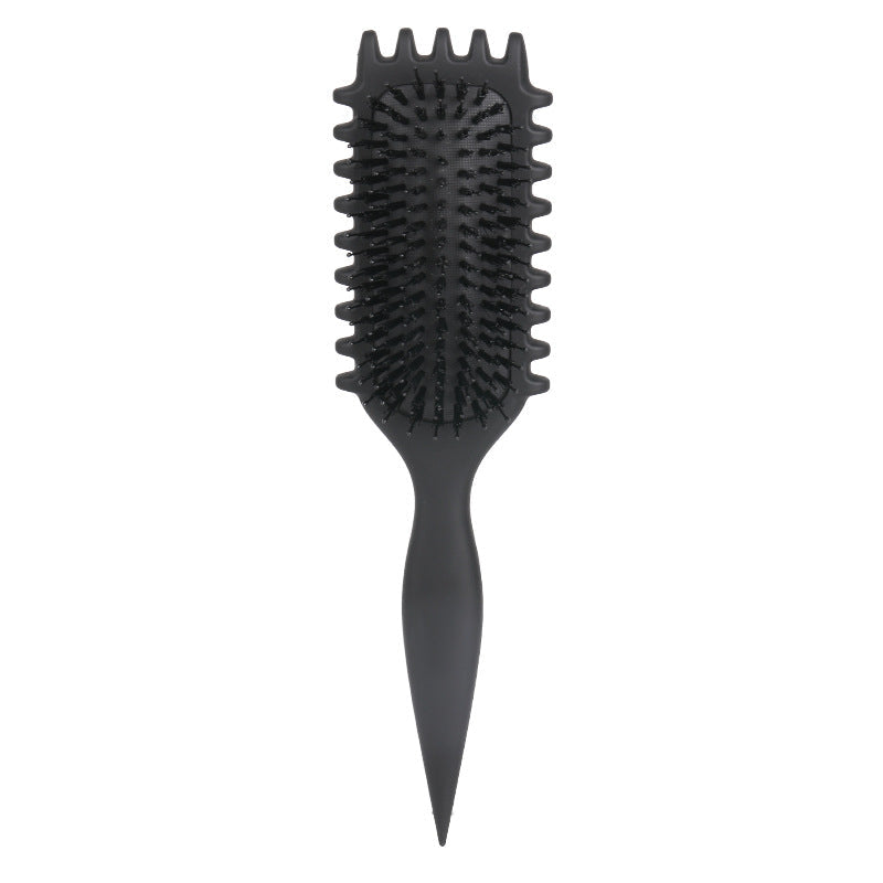 Close-up of innovative bristles on the unisex curl defining hair brush