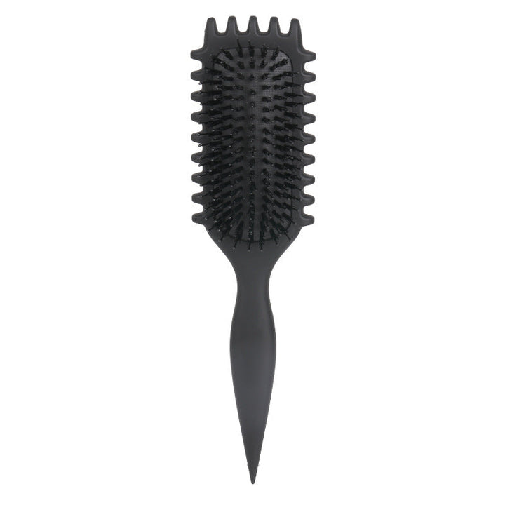 Close-up of innovative bristles on the unisex curl defining hair brush
