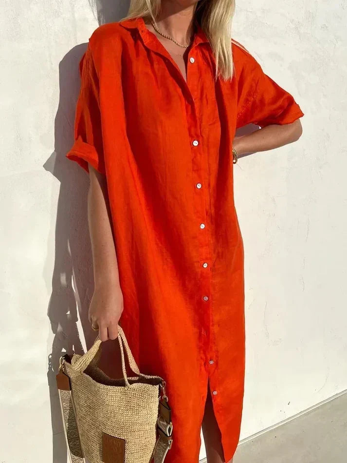 Back view of a lightweight women's summer dress styled for beach wear