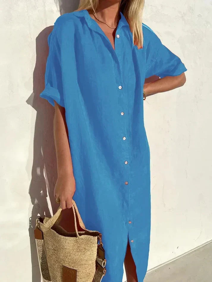 Women's casual button-down beach dress showing front button closure and collar