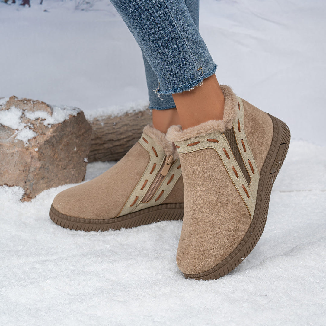 Side view of women's winter ankle boots showing sturdy grip sole