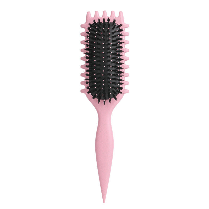 Top view of the anti-frizz curl defining brush beauty accessory