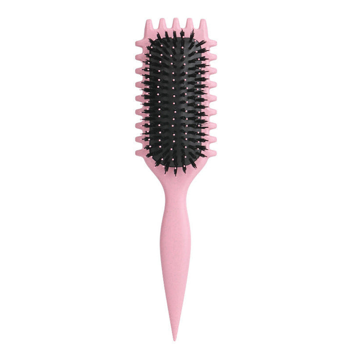 Top view of the anti-frizz curl defining brush beauty accessory