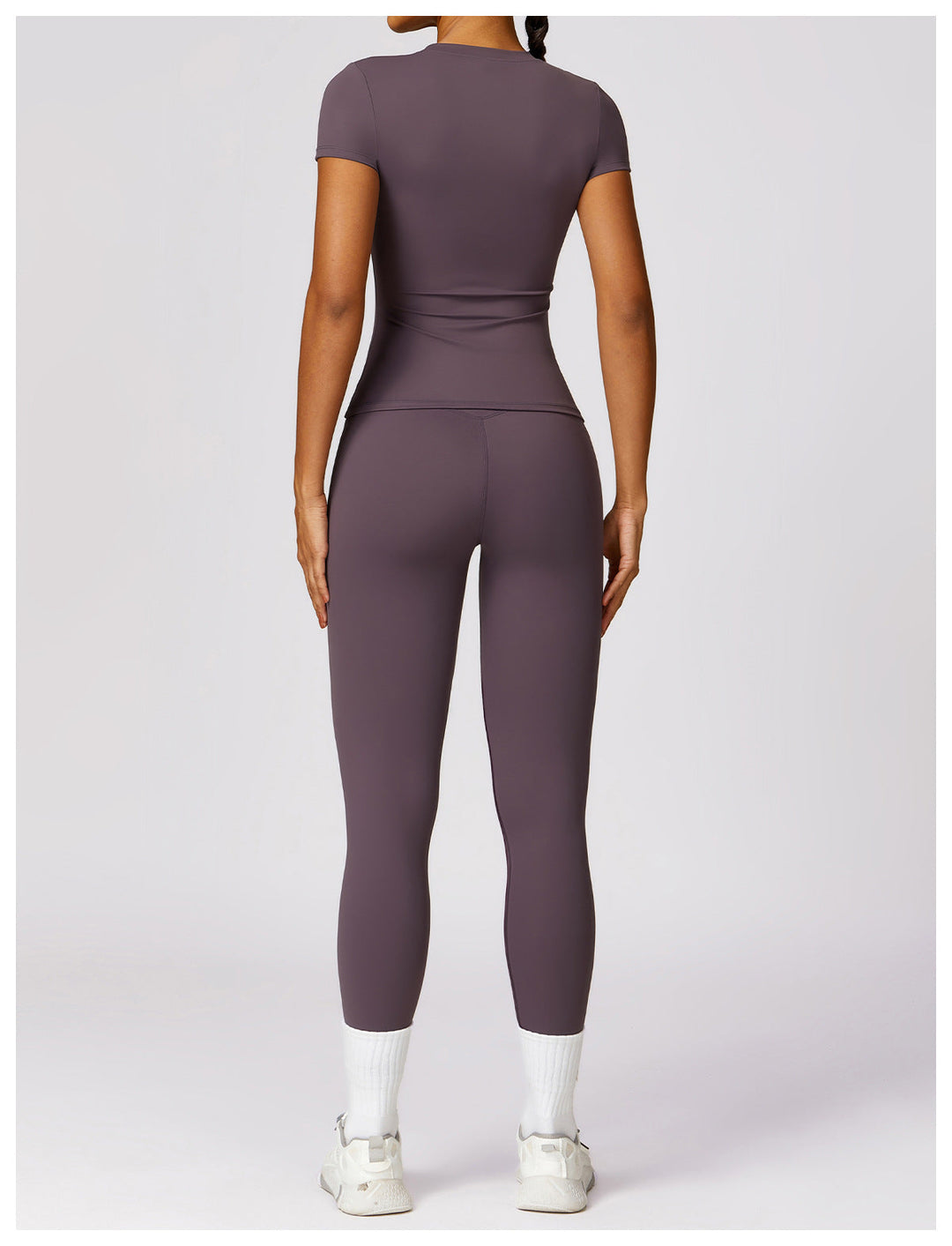 Flat lay of womens 2-piece workout clothes and fitness outfit