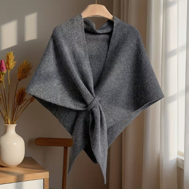 Comfortable oversized shawl scarf worn as a warm winter poncho