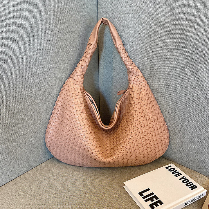 Bohemian shoulder bag flat lay showcasing shape and design