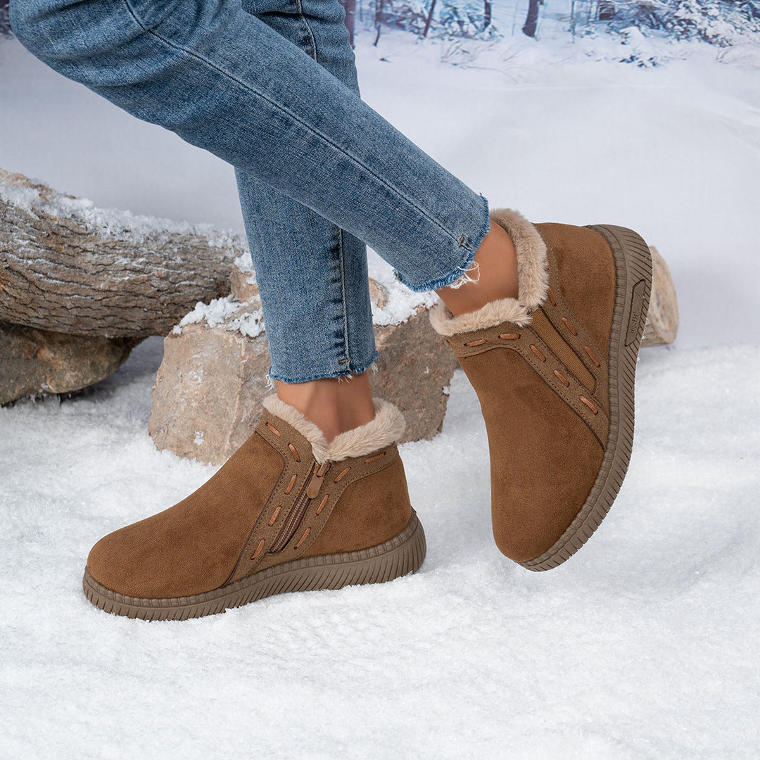 Close-up of warm faux fur lining inside comfortable winter ankle boots