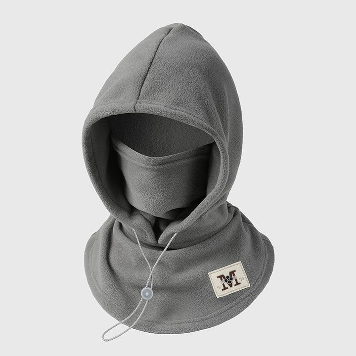 Top view of the windproof hooded cap folded flat for travel