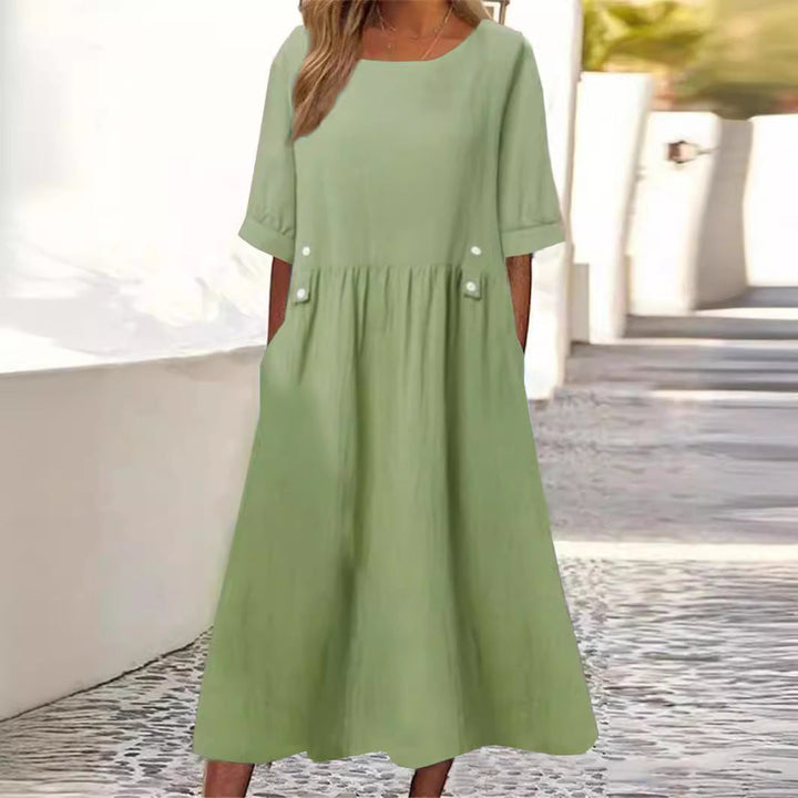 Grey women's casual midi dress with round neck, lifestyle shot