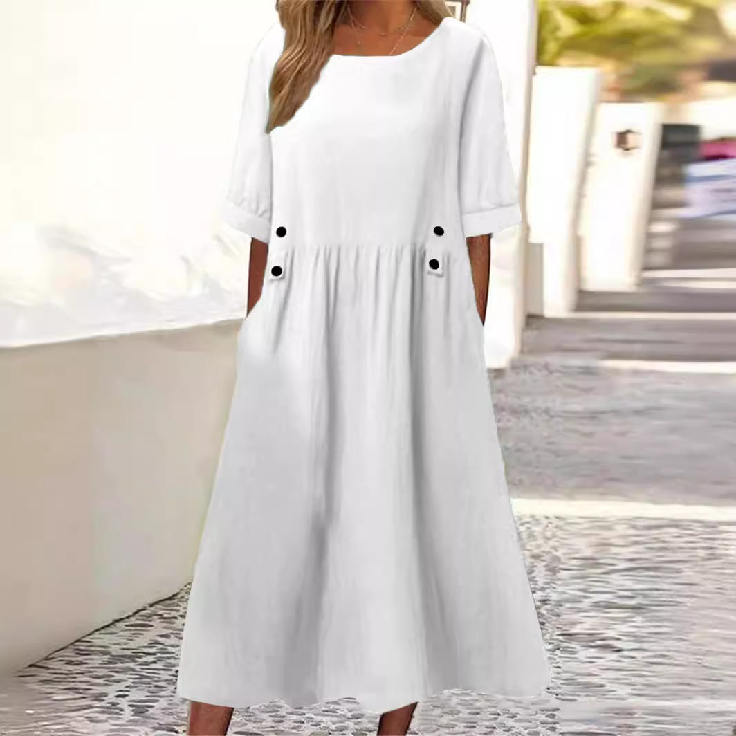White women's casual midi dress featuring short sleeves