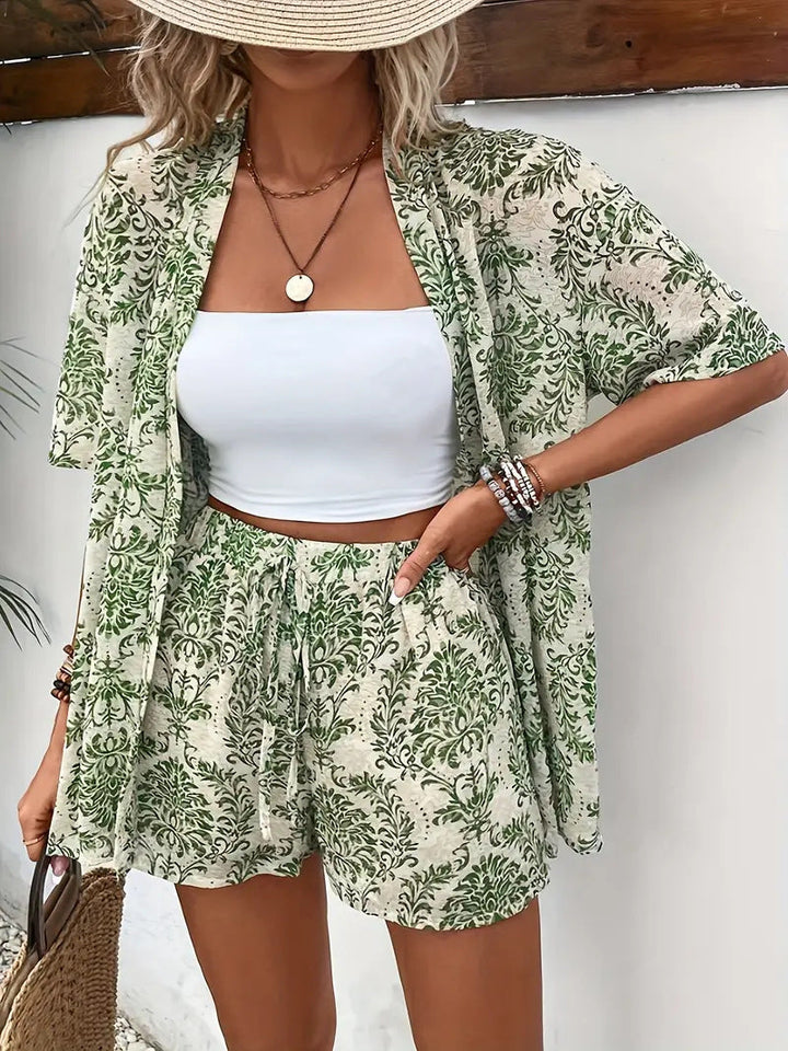 Model posing in the lightweight kimono cardigan and high waisted shorts