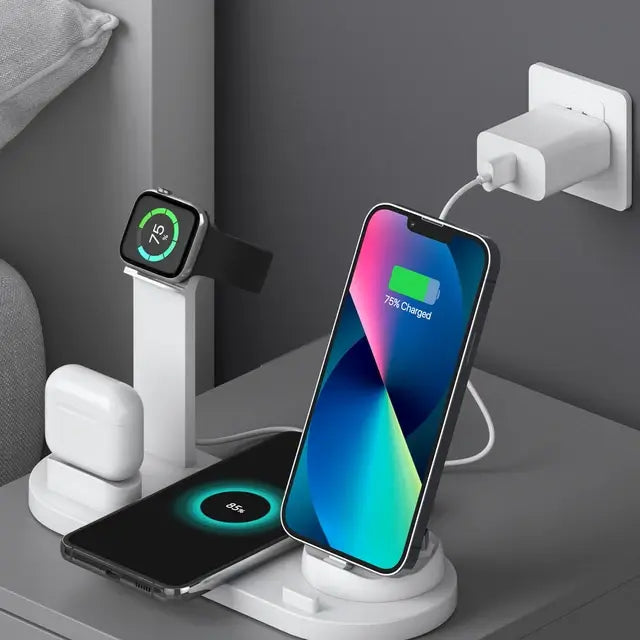White wireless charging dock plugged into a wall outlet on a modern nightstand