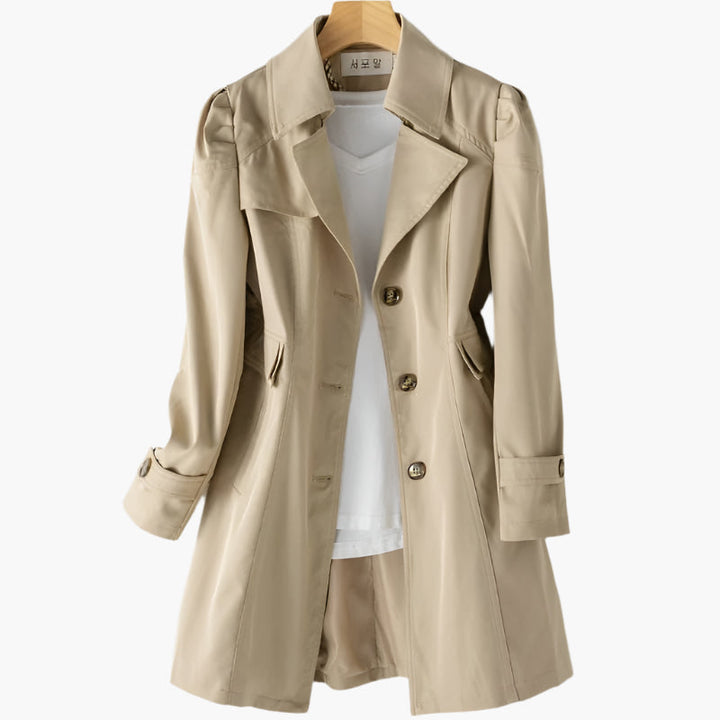Side profile of womens longline blazer coat showcasing structured shoulders