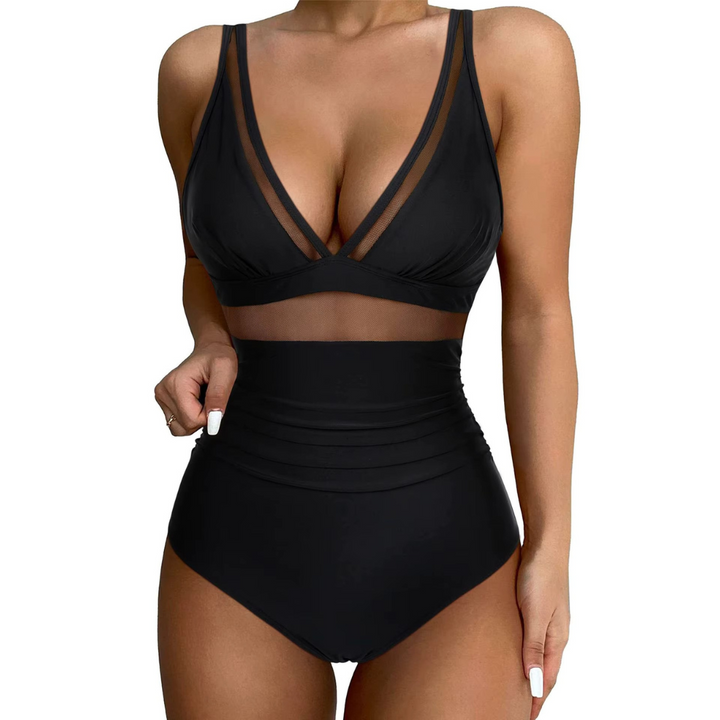 Front view of a woman wearing a solid black high-waisted swimsuit with mesh panels and adjustable straps.