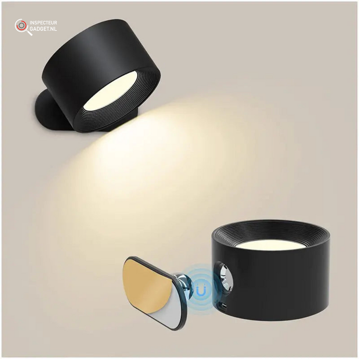 Black cordless 360 wall lamp casting warm light onto a wall surface