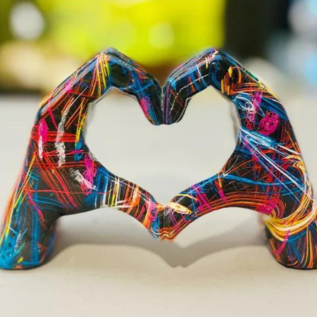 Colorful hand art sculpture in heart shape for modern home decor and shelf styling