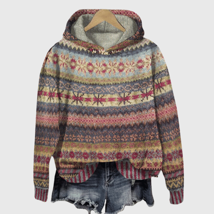 Women's grey vintage Fair Isle hooded sweater on a hanger