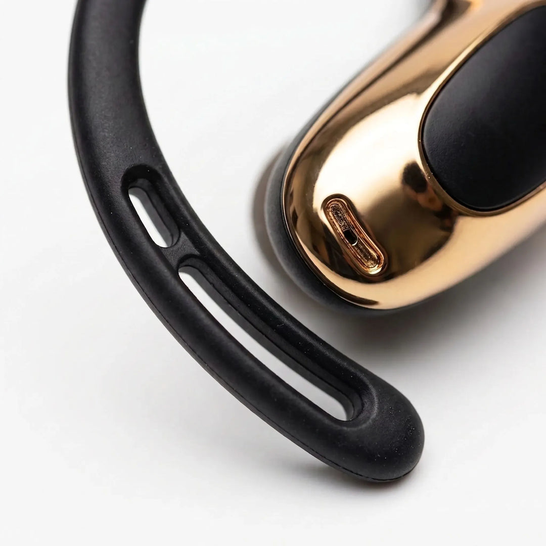 Grey bluetooth earbuds with noise reduction mic and secure ear hook