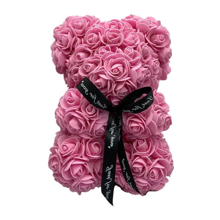 Full body shot of artificial rose teddy bear on display