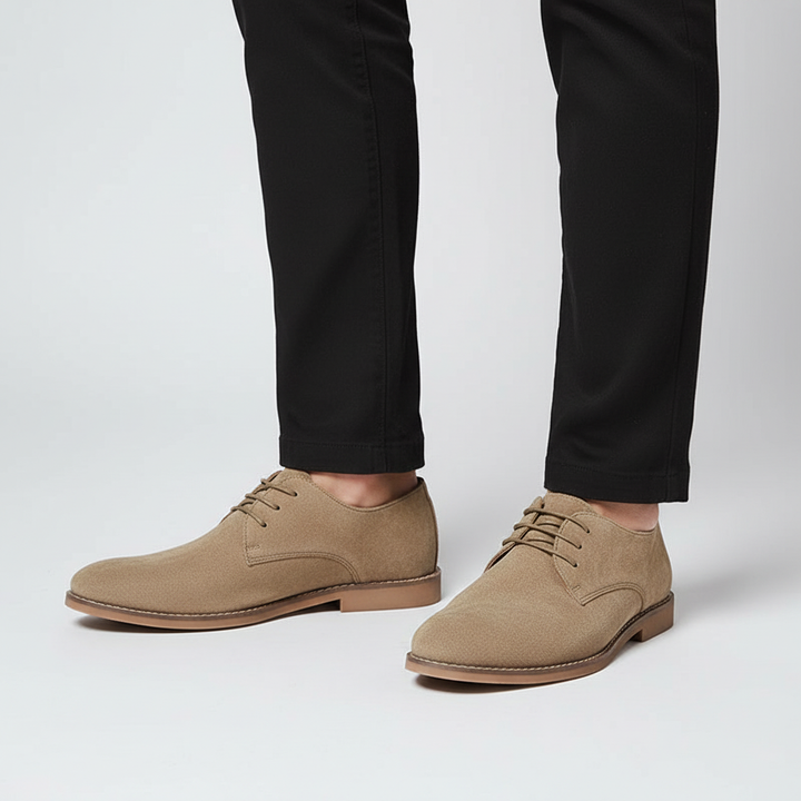 Top down view of brown leather lace-up oxford shoes for men showing stitching details