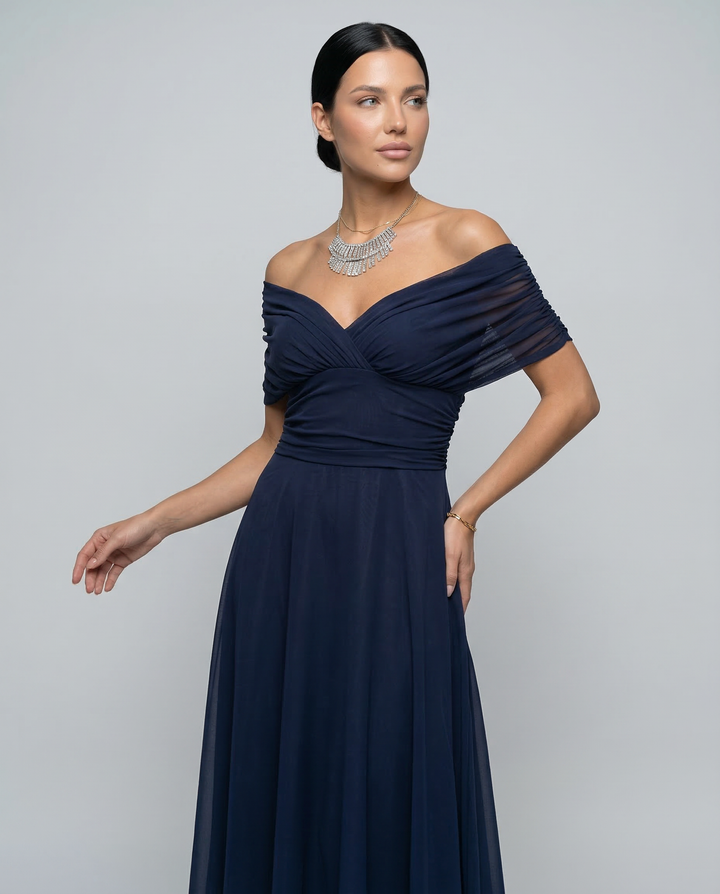 Sophisticated party dress with off shoulder neckline and draped skirt