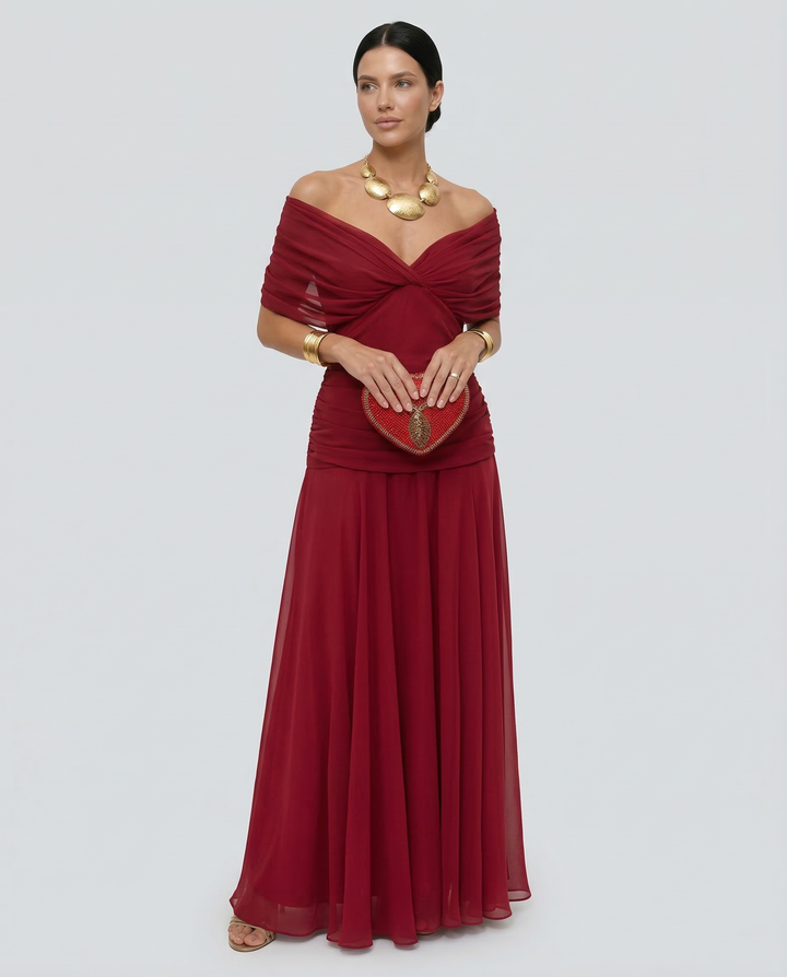 Elegant gala dress showcasing soft draping and off shoulder cut for women