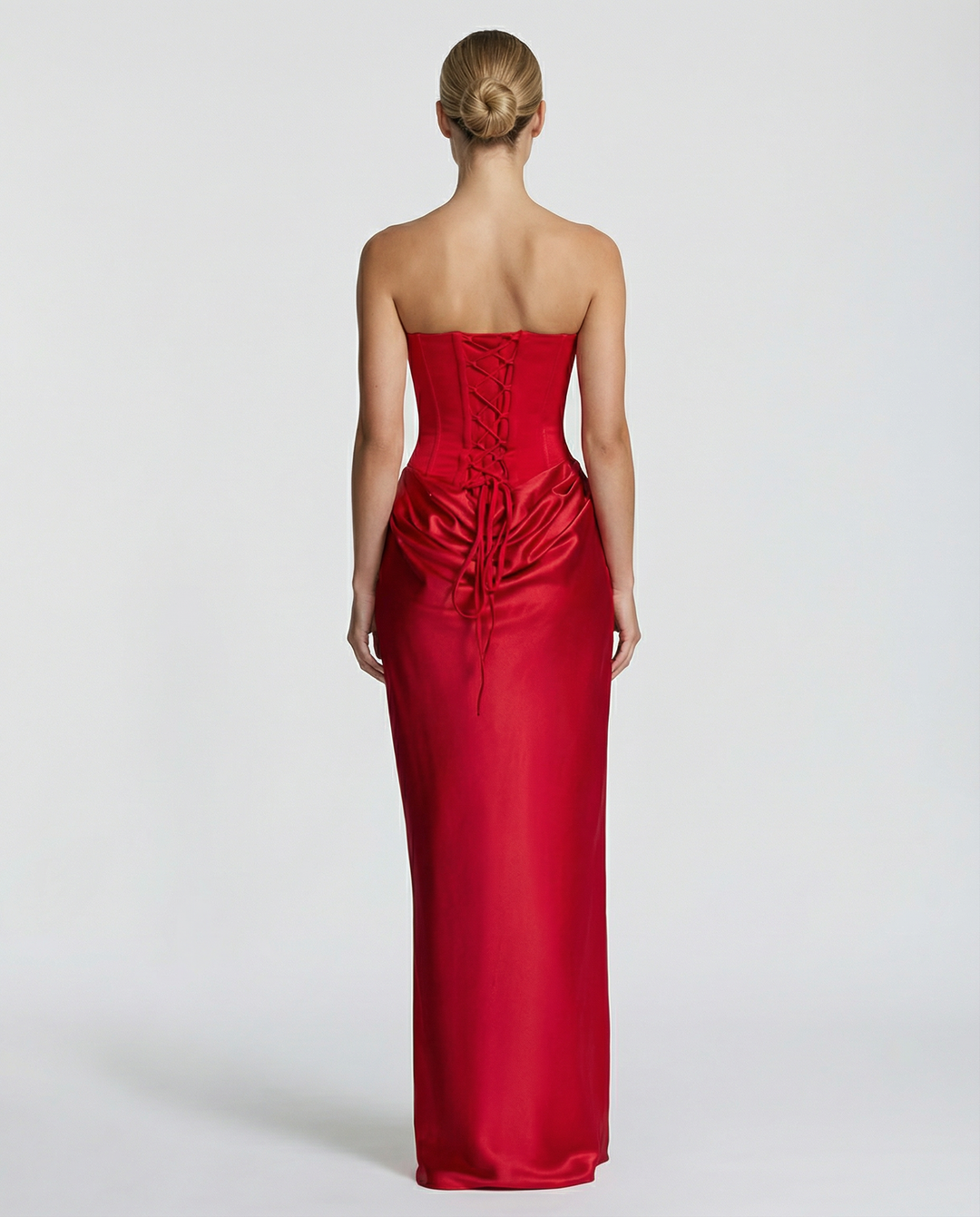 Full length view of a woman wearing a sleeveless black evening dress