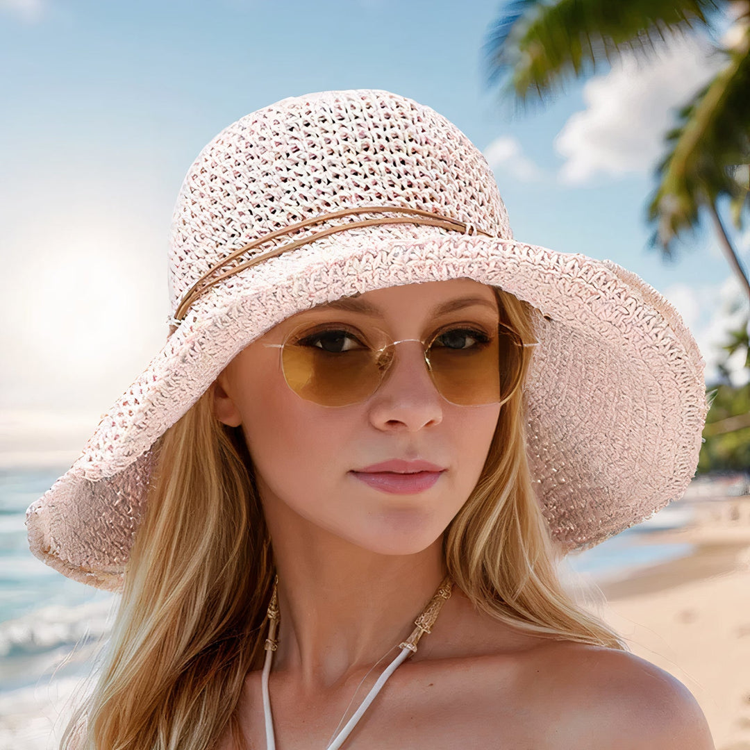 Foldable women's wide-brim sun hat for summer travel and UV protection