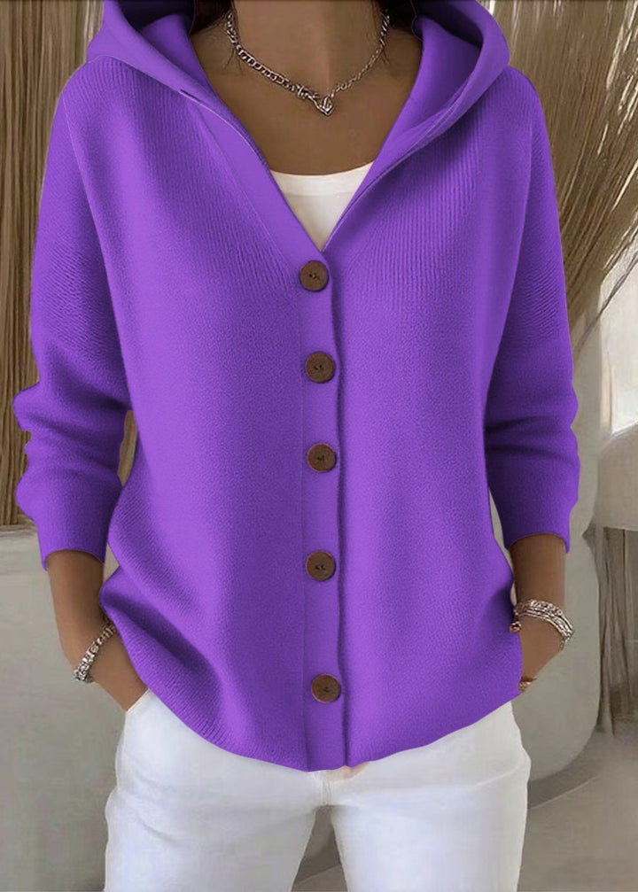 Close-up of knit texture and button details on women's hooded cardigan