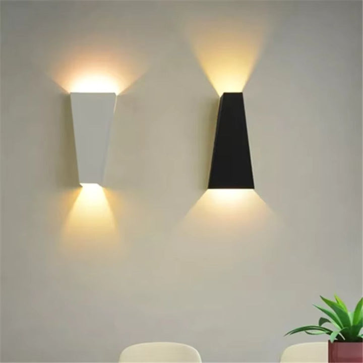 Close-up of the sleek black modern wall light showing premium finish