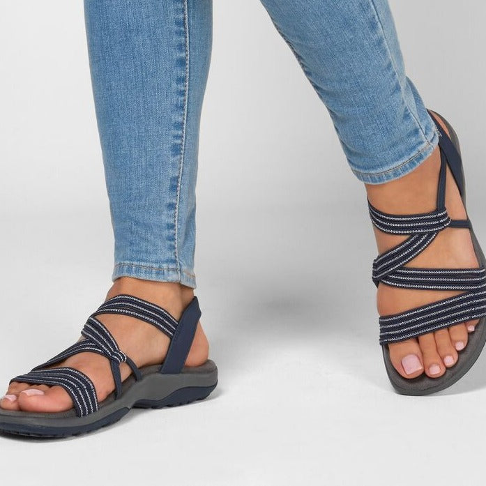 Top-down view of womens summer sandals highlighting breathable straps and insole