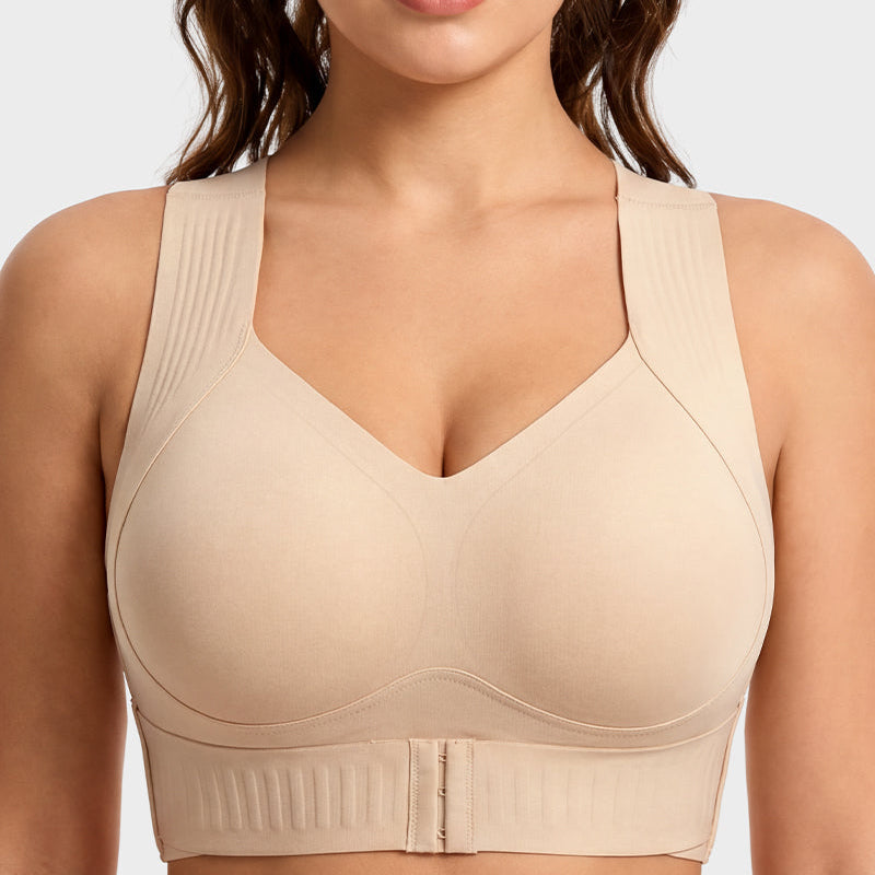 Close up of nude wireless sports bra with front button closure