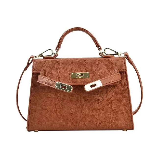 Close-up of premium material and hardware on the fashion shoulder bag