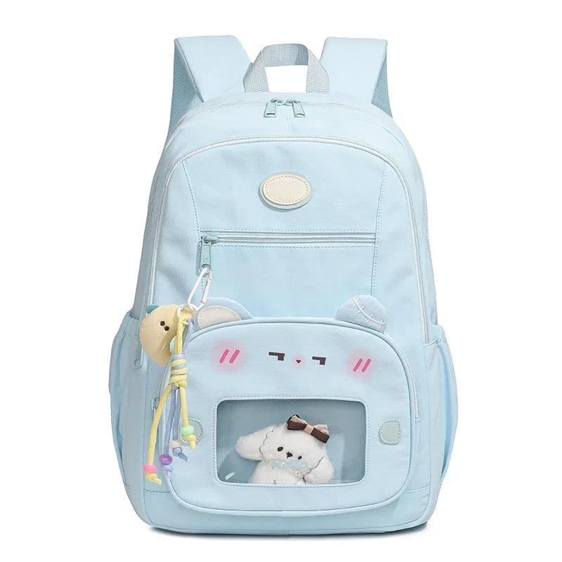 Hanging shot of the women's transparent pocket daypack in soft neutral color tones