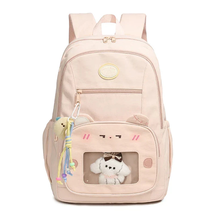 Interior compartment of the preppy backpack showing spacious storage and laptop sleeve