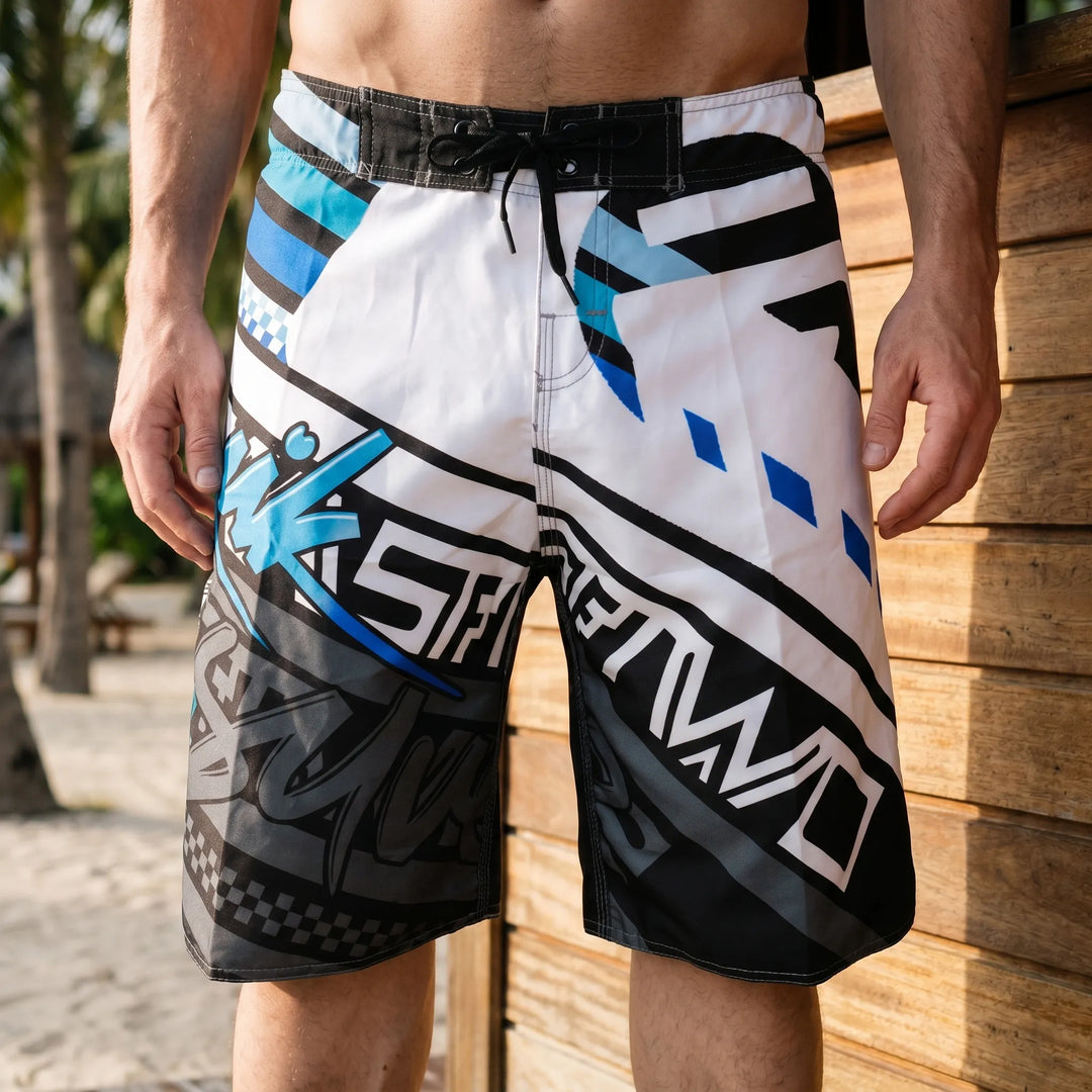 Close-up view of men wearing printed swim shorts at the beach