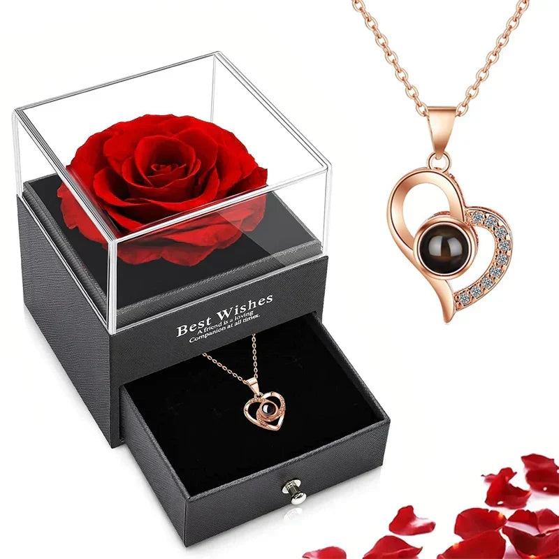 Women's heart pendant 100 languages necklace displayed with gift box and red rose
