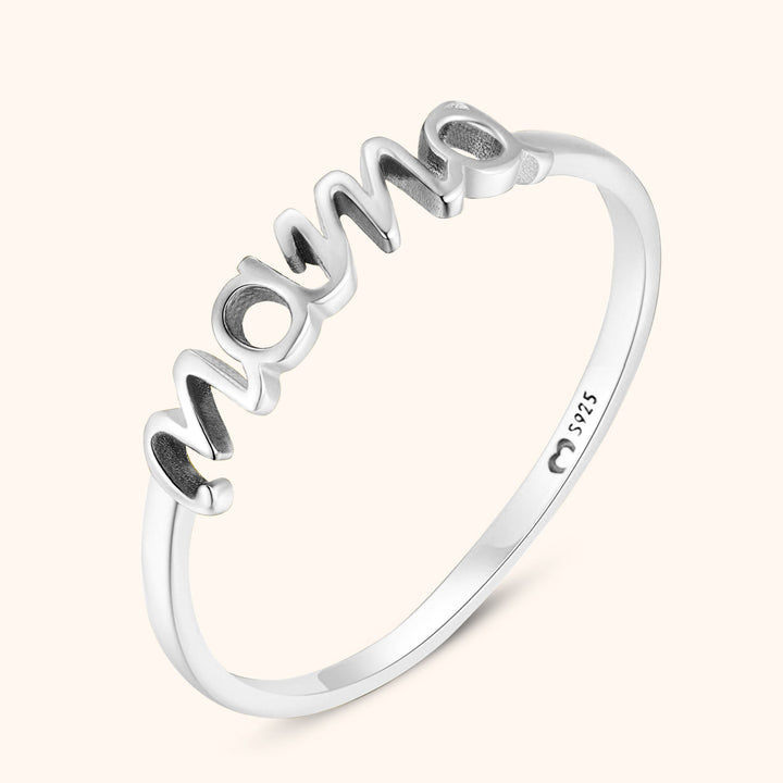 Elegant silver mama ring showcasing minimalist design and shiny finish