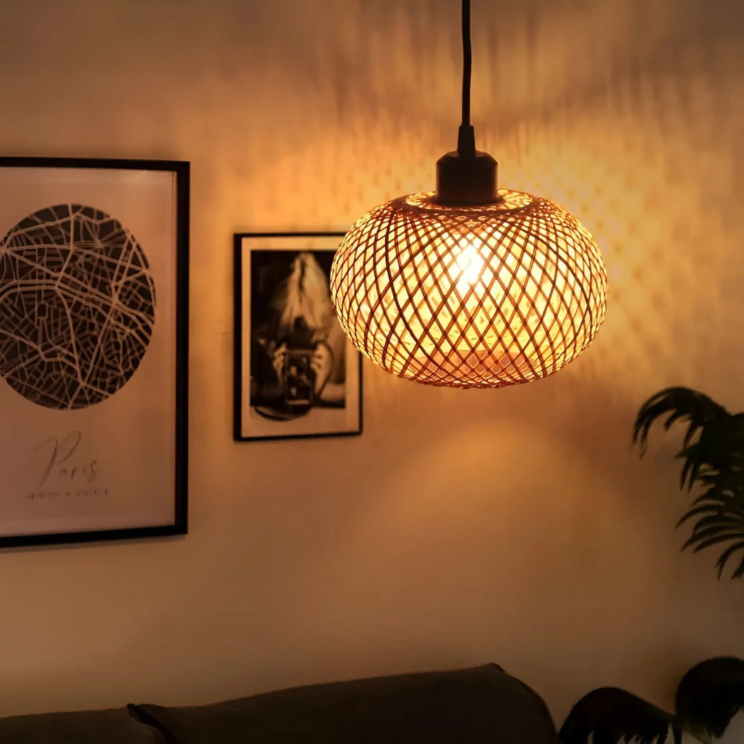 Close up shot of handcrafted rattan pattern on hanging ceiling lamp