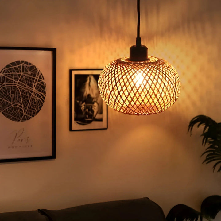 Close up shot of handcrafted rattan pattern on hanging ceiling lamp