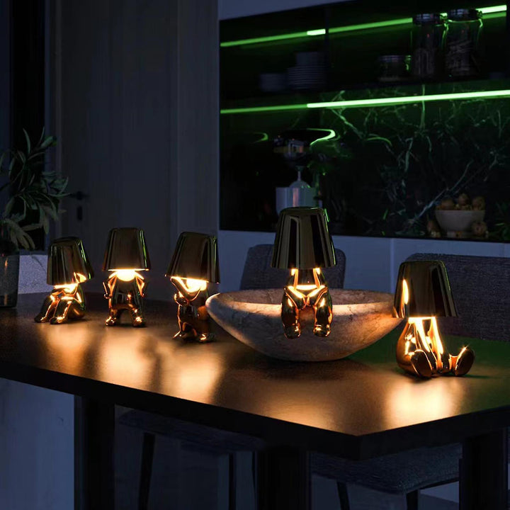 USB rechargeable cordless table lamp illuminating a cozy living room space