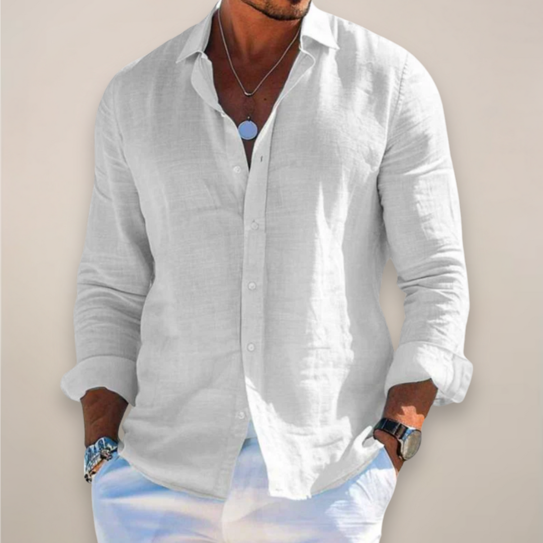 Man wearing a white long sleeve button-down shirt with a soft collar