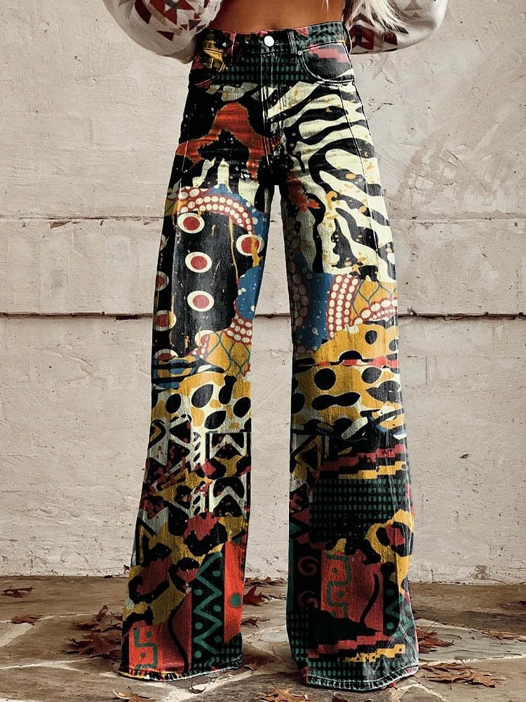 Model wearing retro printed trousers and walking to show wide leg movement