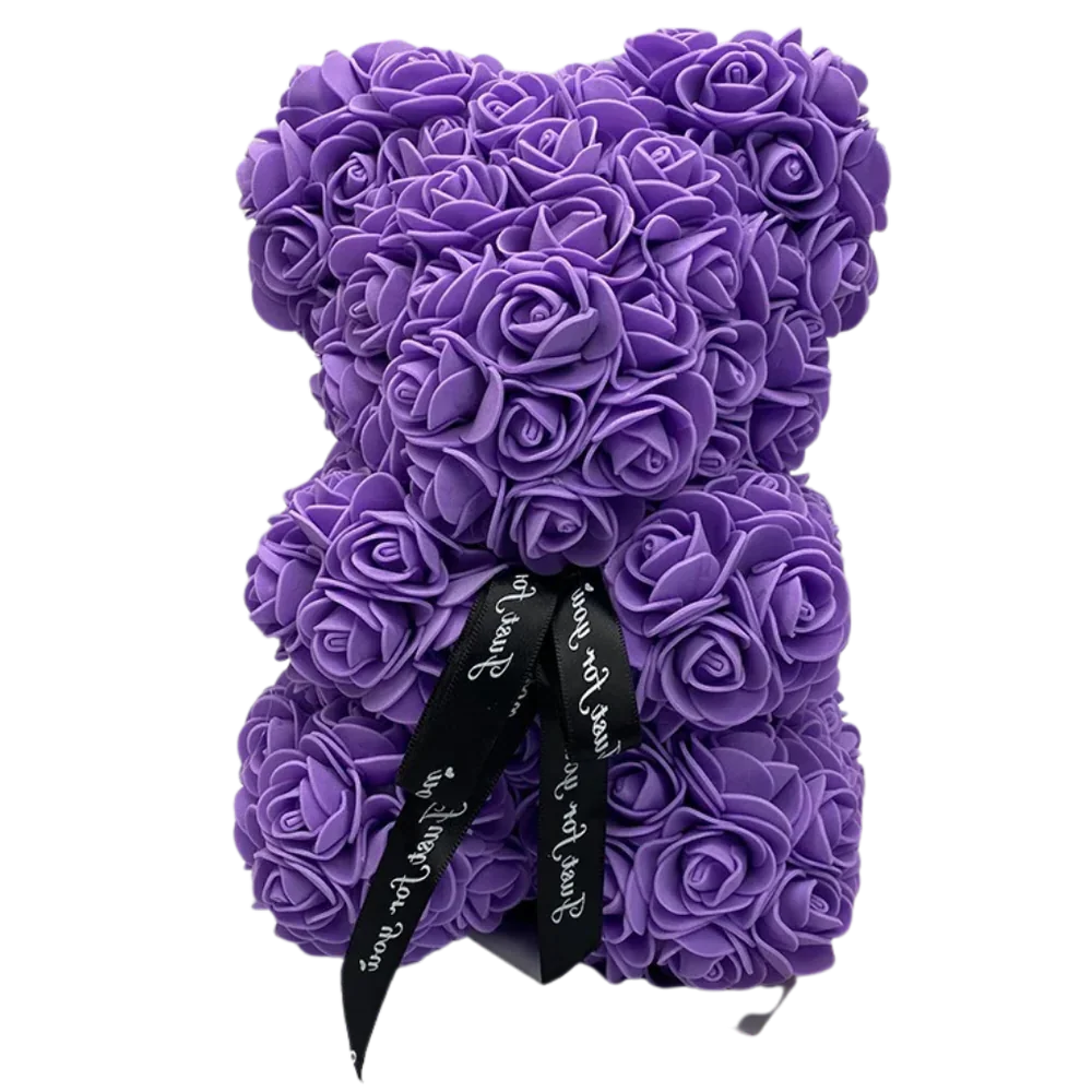 Cute flower teddy bear made of synthetic roses in gift box