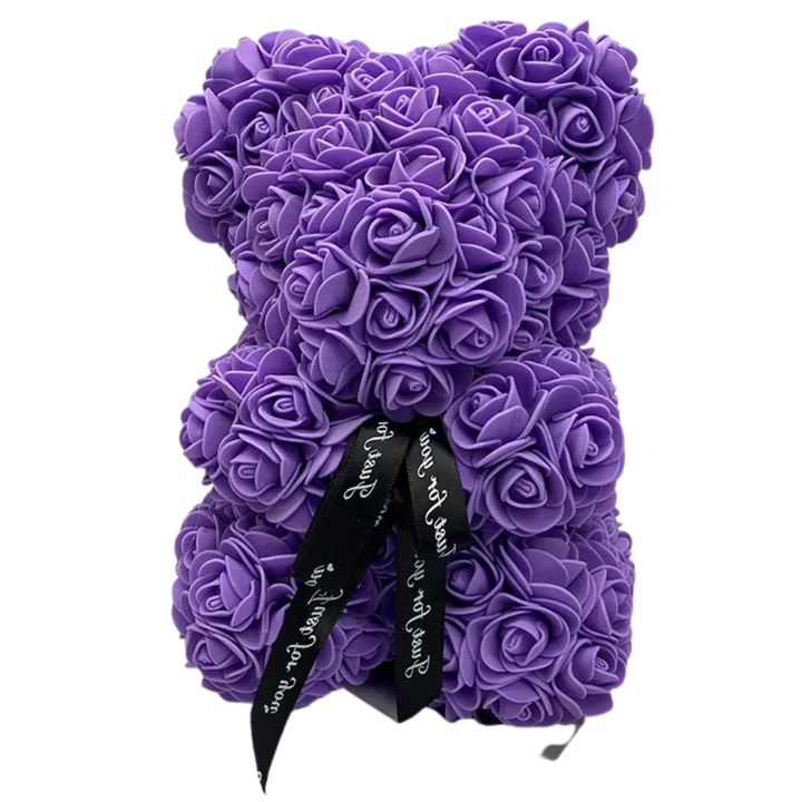 Cute flower teddy bear made of synthetic roses in gift box