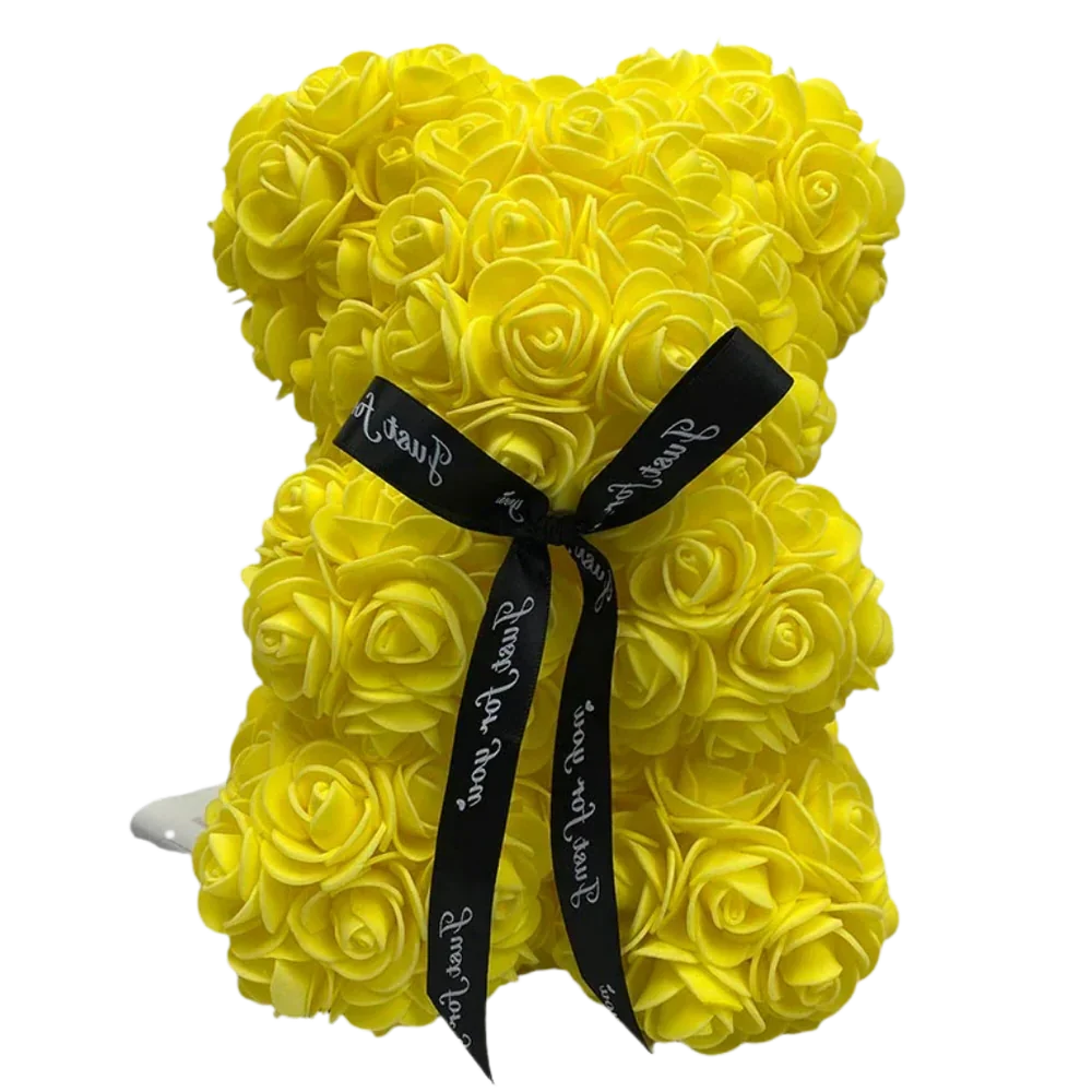 Red rose bear toy holding a heart symbol romantic gift