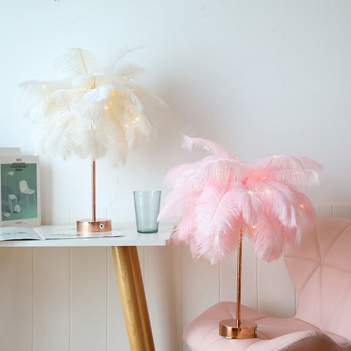 OstrichGlow feather night light showing detailed soft plumes and a rose-gold base
